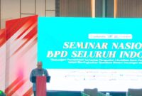 Direktur Bank Bengkulu, Iswahyudi saat menyampaikan sambutan saat pembukaan Seminar. (Andreas/Warta Aspirasi)